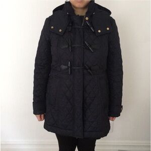 Navy like new Burberry Brit coat. Quilted with detachable hood black toggle